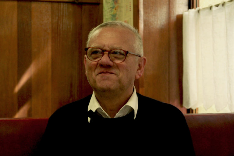 Jean-Luc, the owner of Café des Fédérations